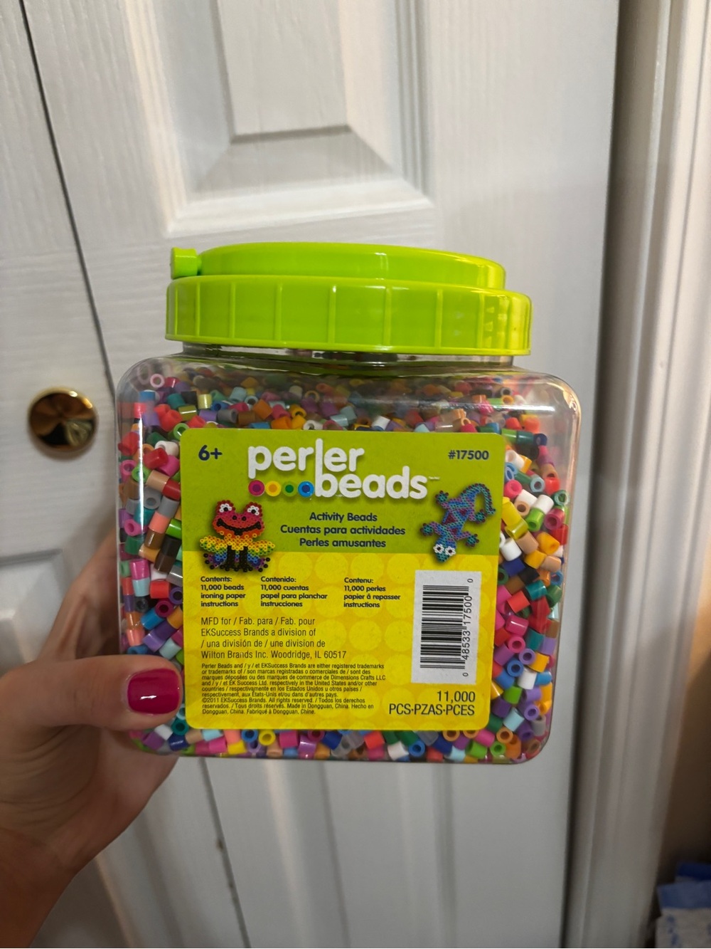 Jar of Multi Color Perler Beads + form and instructions.